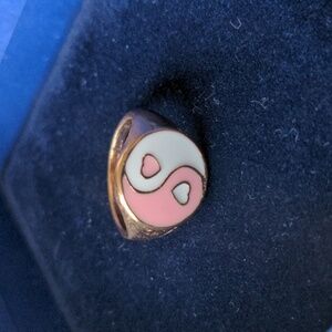 Gold tone pink ring, two loving hearts inside a Yin Yang symbol, size 7.75